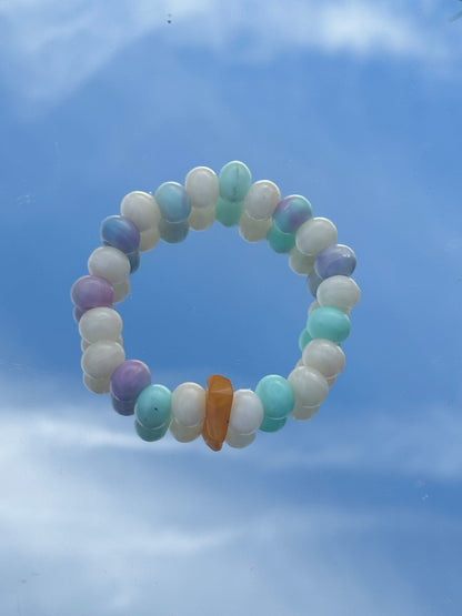 Bracelet with ocean plastic and recycled amber